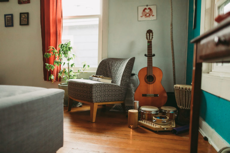 Living room with seat and musical instruments